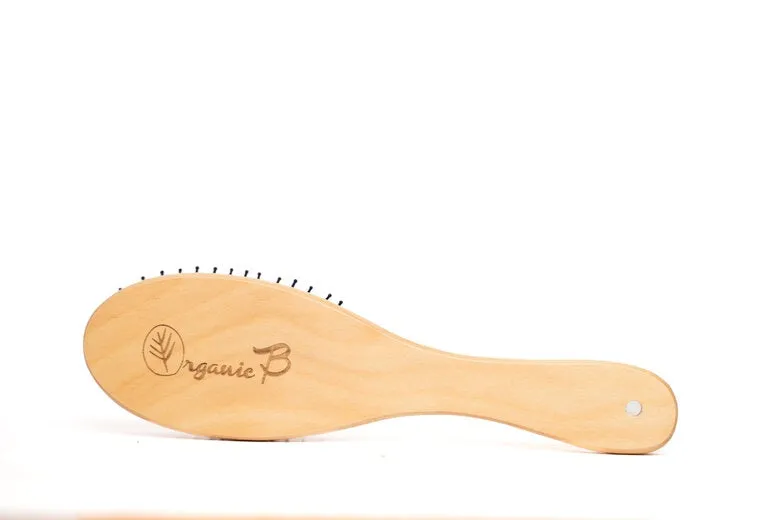 "Volumonising &  Anti-frizz Eco-strong Teak Paddle hairbrush | Oval, Small"